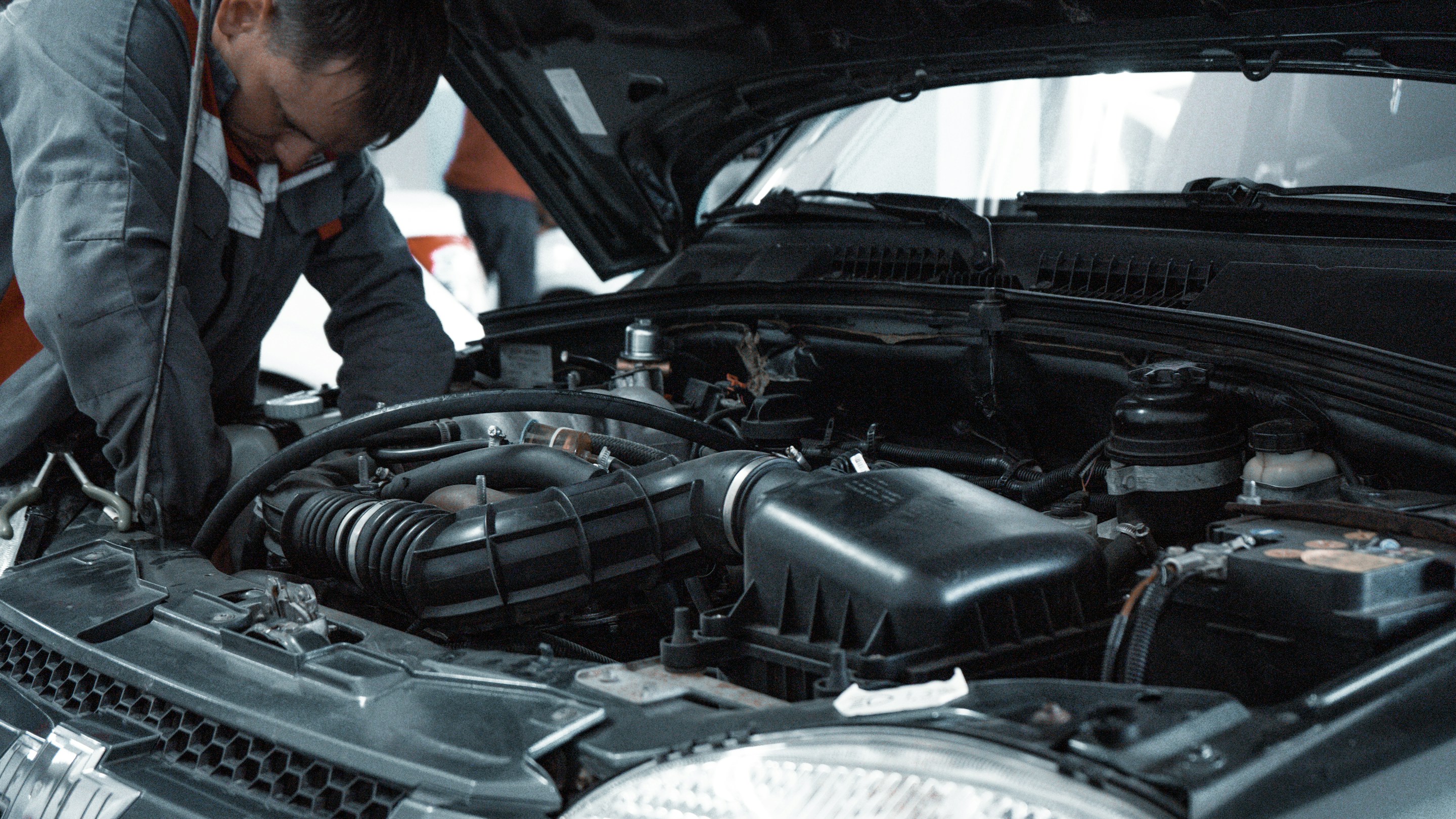 Mechanic working on engine